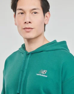 Outlet New Balance - UNI-SSENTIALS FRENCH TERRY HOODIE Vert